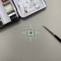 Snowflake Pendant set with Emeralds and Diamonds