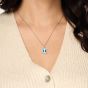 Regal Emerald Cut Aquamarine and Diamond Pendant