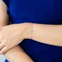 Snowflake diamond bracelet on a woman's arm