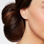 diamond stud earrings in ear 