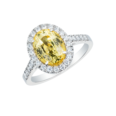 Regal Ring set with an oval cut yellow sapphire and diamonds